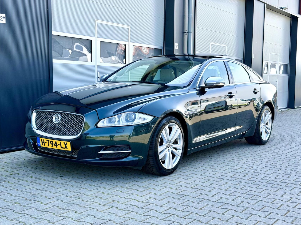 Jaguar XJ - 3.0 V6 SC AWD Portfolio | Pano | British Racing Green - AutoWereld.nl