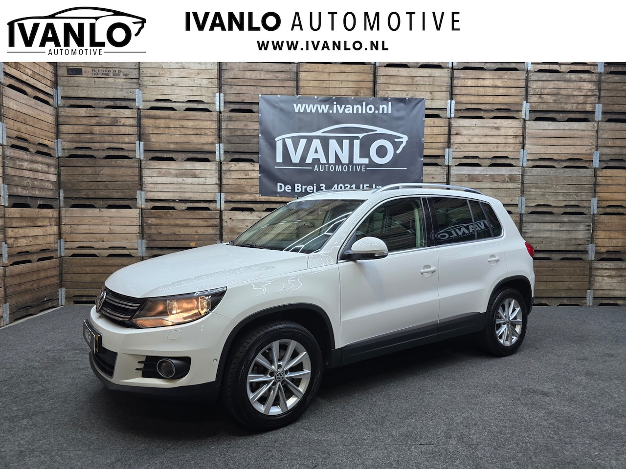 Volkswagen Tiguan - 2.0 TSI Sport&Style 4motion R-line Edition Pano PDC Trekhaak LM - AutoWereld.nl