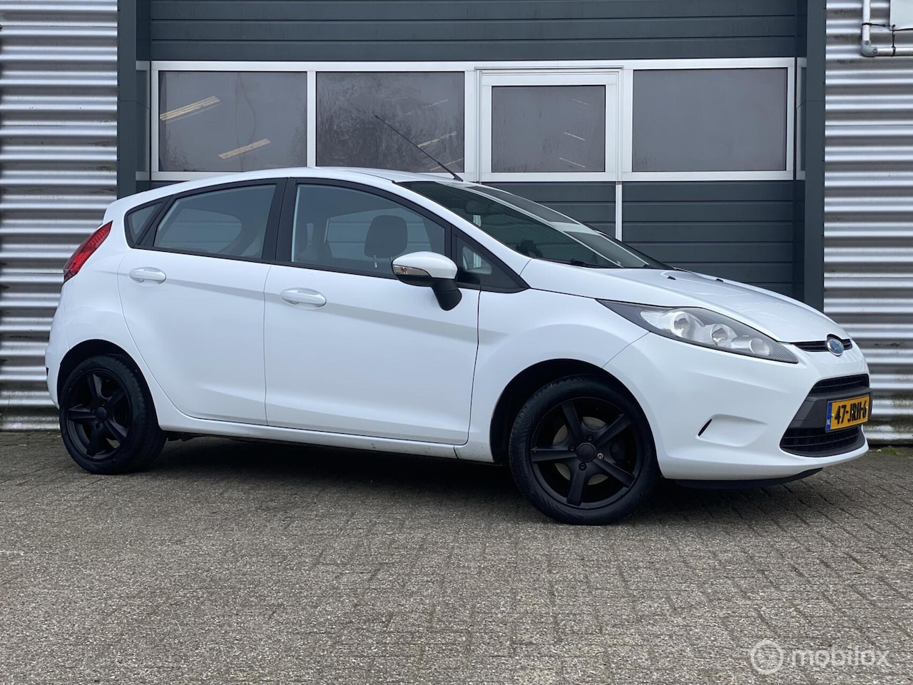 Ford Fiesta - 1.25 Titanium 5D|O-houdshist|15 Inch|Nette Auto! - AutoWereld.nl