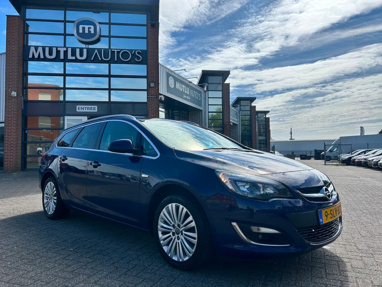 Opel Astra Sports Tourer - 1.4 Turbo Design Edition 5deurs PDC NAP Airco Cruise - AutoWereld.nl
