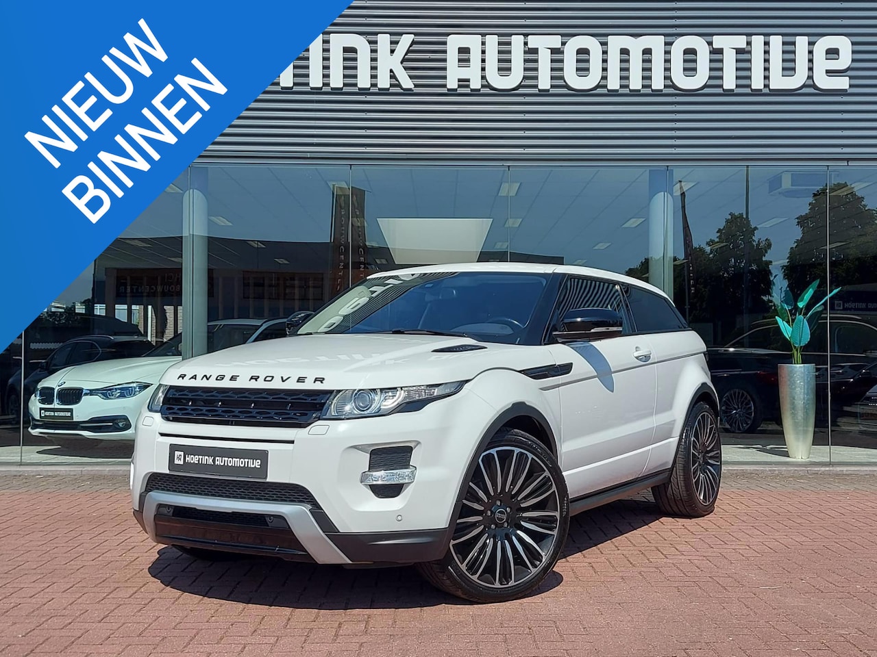 Land Rover Range Rover Evoque Coupé - 2.0 Si 4WD Dynamic | Leer | Cold Climate Pack - AutoWereld.nl
