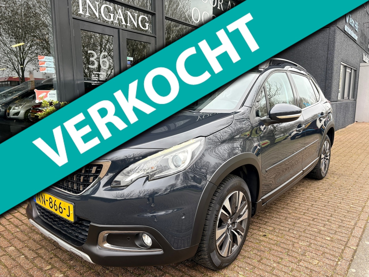 Peugeot 2008 - 1.2 PureTech Allure Pano/Navi/Clima/PDC/Trekh. - AutoWereld.nl