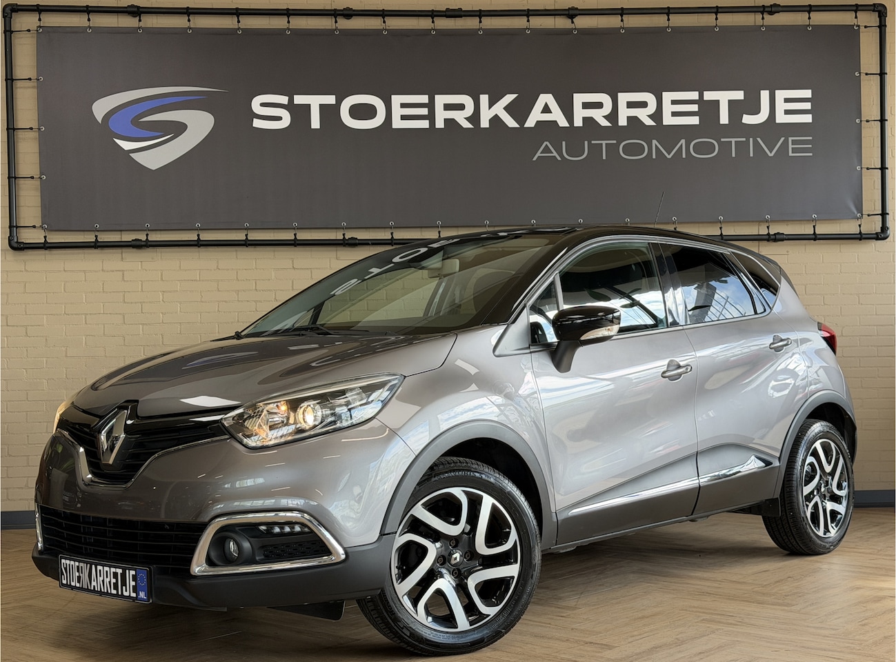 Renault Captur - 0.9 TCe Dynamique R-Link Navi | 17" | Camera | Keyless | Stoelverwarming | 100% Onderhoude - AutoWereld.nl