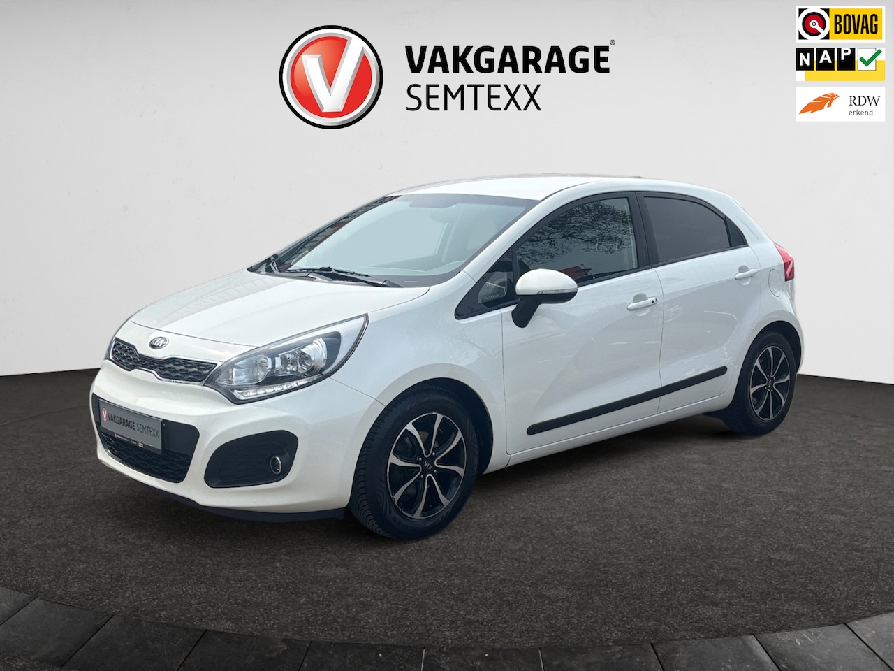 Kia Rio - 1.2 CVVT Super Pack | Org. NL | Clima | All-Season | Cruise | Trekhaak | Keyless Entry | K - AutoWereld.nl