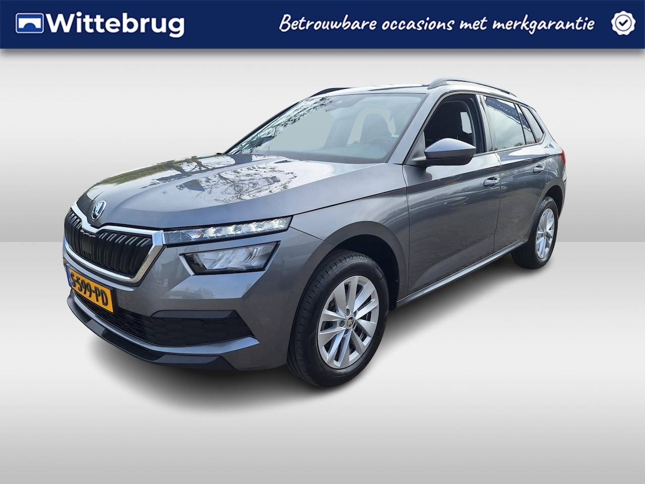 Skoda Kamiq - 1.0 TSI Ambition Comfort Automaat / Navigatie / PDC - AutoWereld.nl