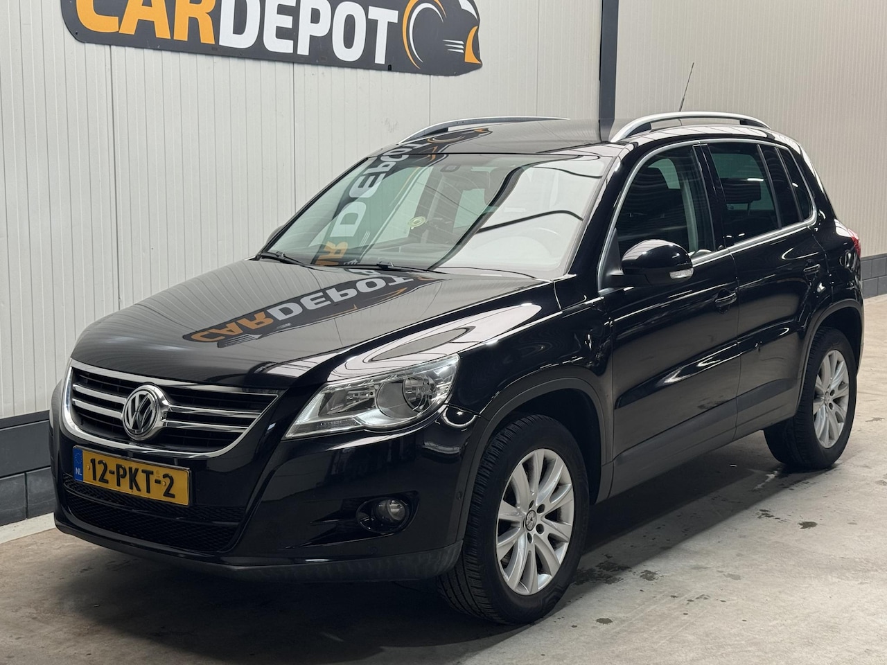 Volkswagen Tiguan - 1.4 TSI Sport&Style - AutoWereld.nl