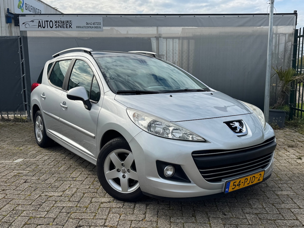 Peugeot 207 SW - 1.4 VTi-NWE APK - Clima - Cruise - Pano - Navi - AutoWereld.nl