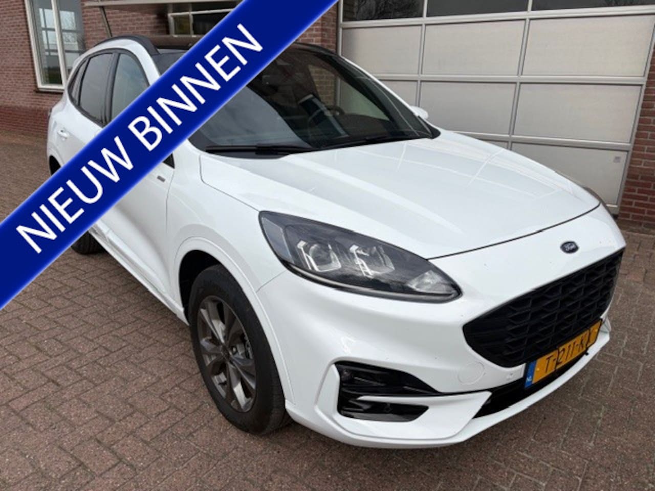 Ford Kuga - 2.5 PHEV ST-Line Winterpack / private glas / zwart dak - AutoWereld.nl