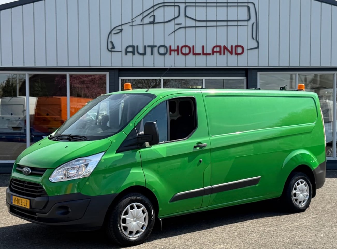 Ford Transit Custom - 2.0 TDCI 77KW 105PK L2H1 EURO 6 AIRCO/ CRUISE CONTROL/ CAMERA/ 100% DEALERONDERHOUDEN - AutoWereld.nl
