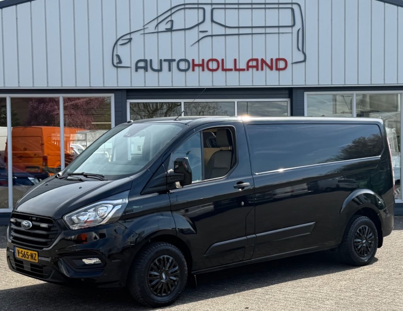 Ford Transit Custom - 2.0 TDCI 96KW 131PK L2H1 EURO 6 AIRCO/ CRUISE CONTROL/ NAVIGATIE/ 100% DEALERONDERHOUDEN - AutoWereld.nl
