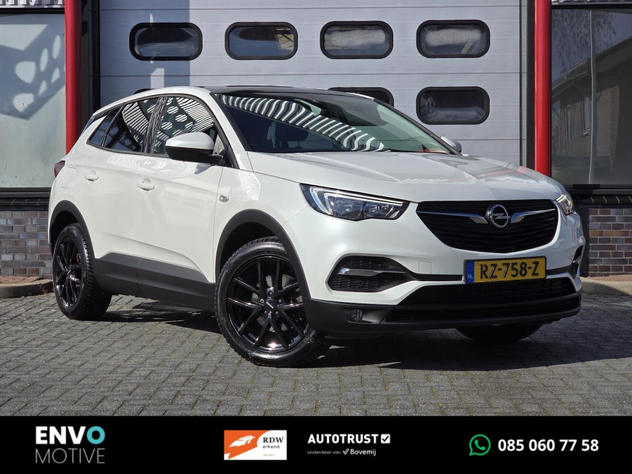 Opel Grandland X - 1.2 Turbo Online Edition Pano/PDC/ECC/Trekhaak - AutoWereld.nl