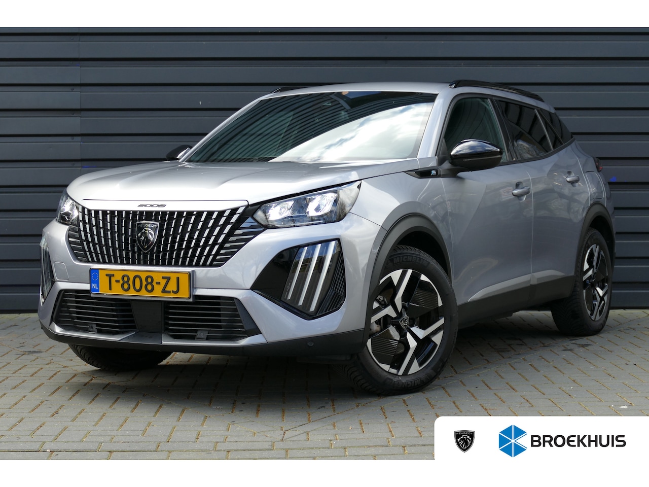 Peugeot e-2008 - EV 156PK 54KWH ALLURE AUTOMAAT / NAVI / CLIMA / CAMERA / 17"LMV / FULL-LED / PDC / BLUETOO - AutoWereld.nl