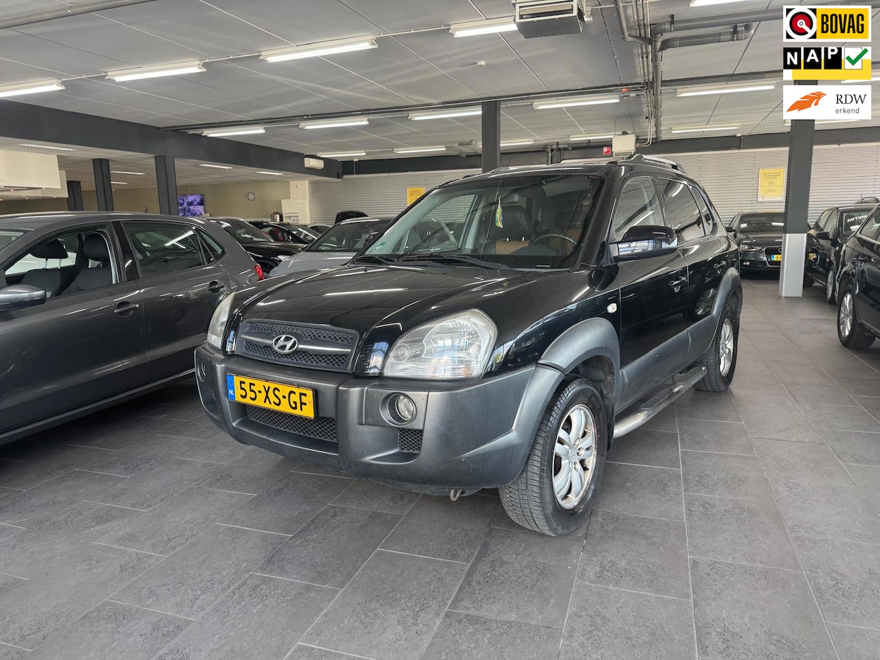 Hyundai Tucson - 2.0i Style Premium LPG g3 leer clima cruise controle lm-velgen elektrische pakket zijbar t - AutoWereld.nl