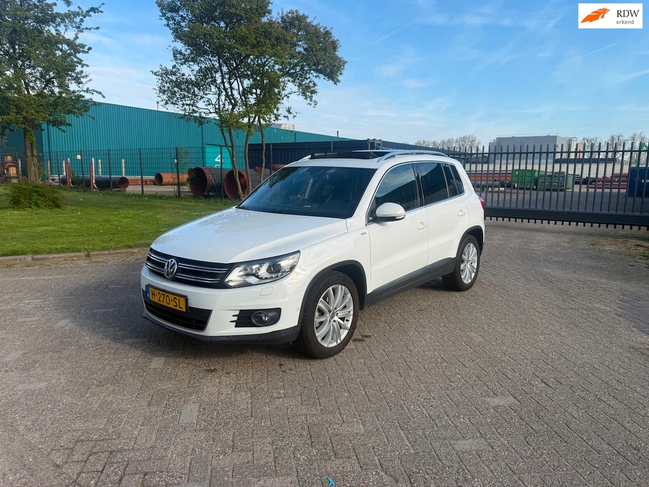 Volkswagen Tiguan - 1.4 TSI R-Line Edition 1.4 TSI R-Line Edition - AutoWereld.nl
