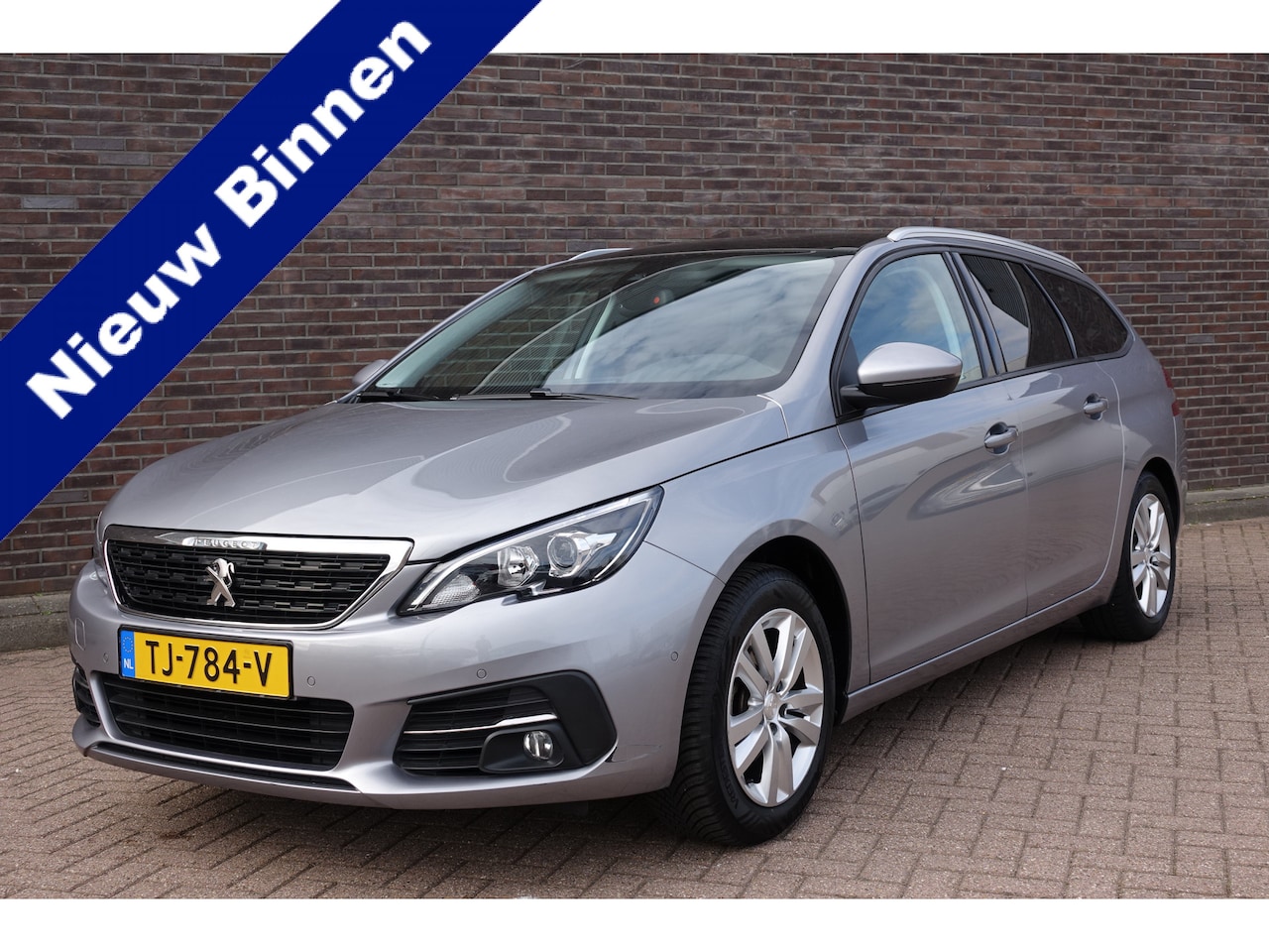 Peugeot 308 SW - 1.2 PureTech Blue Lease Executive 1.2 PureTech Blue Lease Executive, keurige auto, panoramadak - AutoWereld.nl