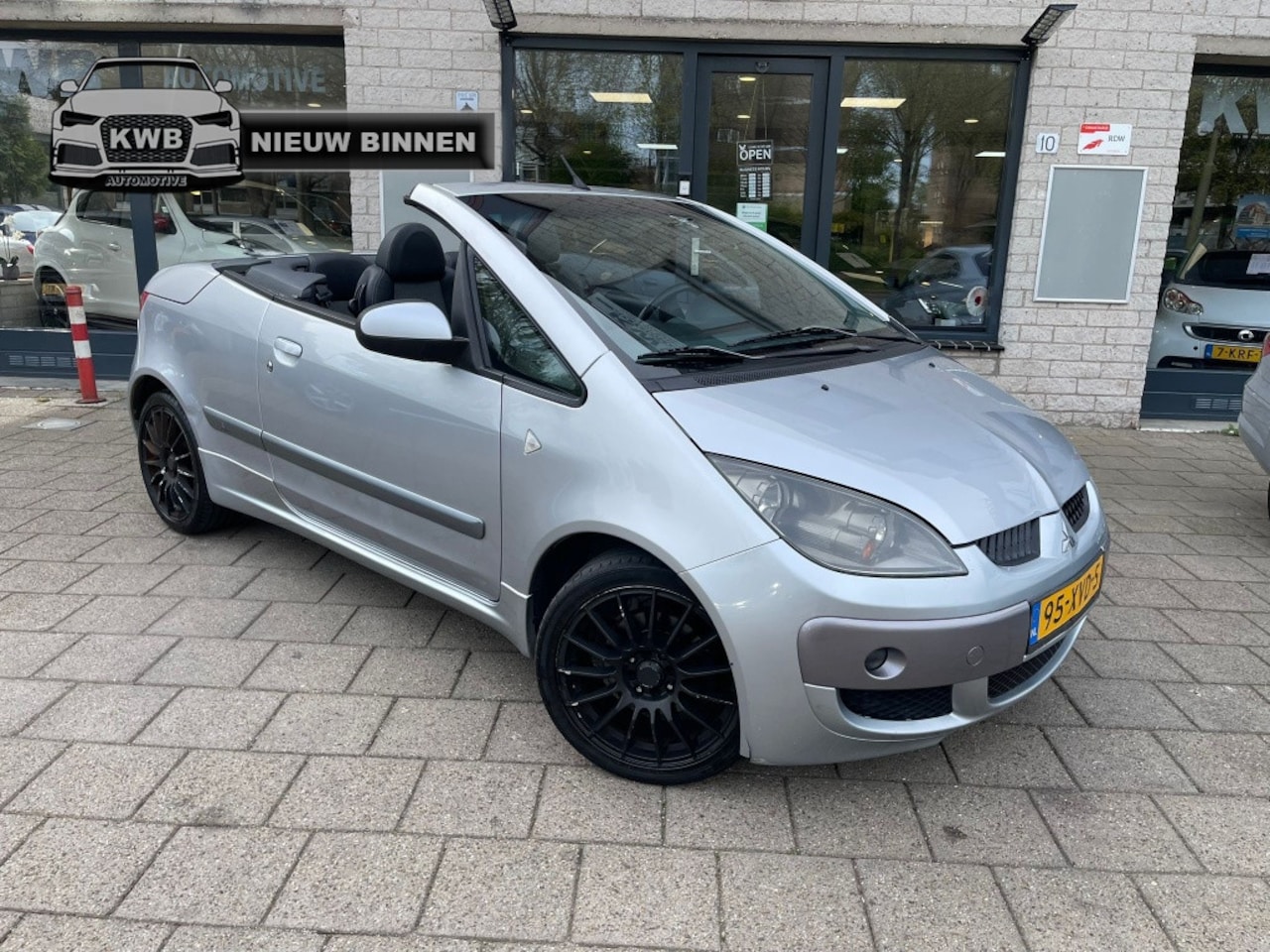 Mitsubishi Colt CZC - 1.5 Turbo Cabrio Leer Carplay - AutoWereld.nl