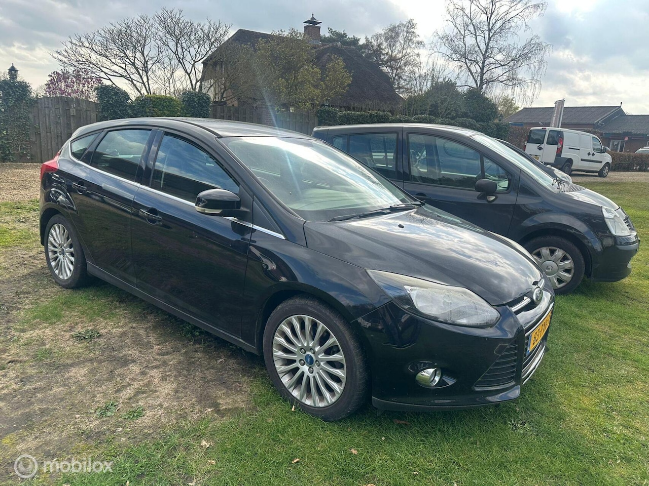 Ford Focus - 1.6 EcoBoost Titanium koppakking lek - AutoWereld.nl