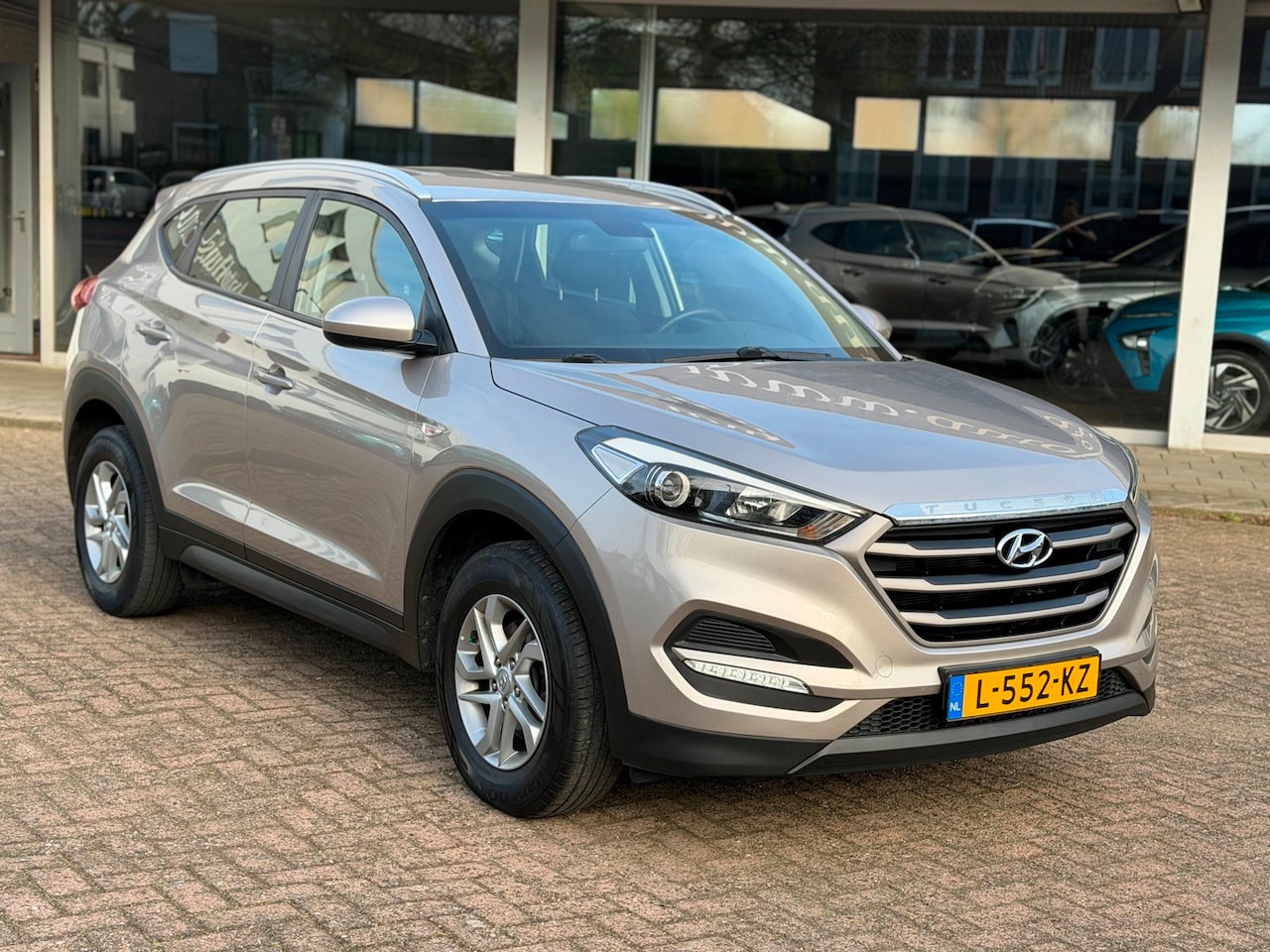 Hyundai Tucson - 1.6 GDi Comfort|Camera|Trekhaak|Nav|CarPlay|Dealer onderhouden - AutoWereld.nl
