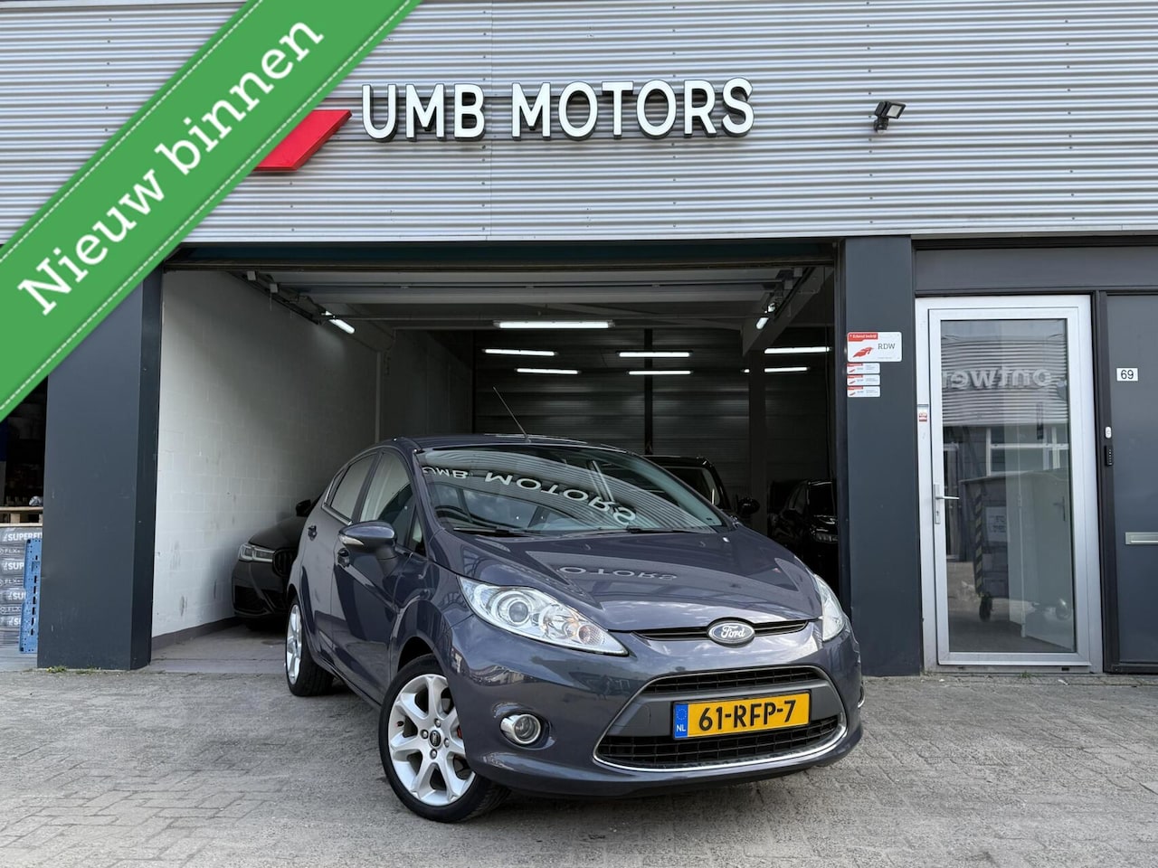 Ford Fiesta - 1.6 Titanium Clima Navi Parkeersensoren - AutoWereld.nl