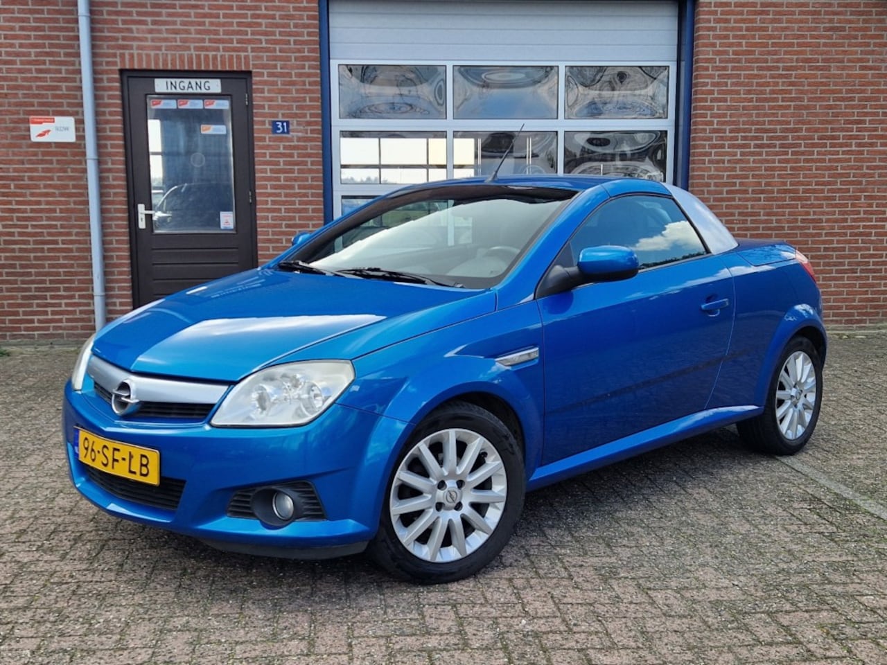 Opel Tigra - 1.8i 16V Sport NL-auto Distributie en APK nieuw , Dak werkt niet elektrisch - AutoWereld.nl