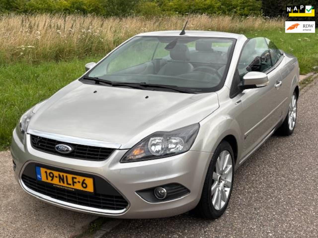 Ford Focus Coupé-Cabriolet - 2.0 Titanium Clima LMV 17" Cruisecontrol Leder Stoelverwarming PDC ABS EBD Dealeronderhoud - AutoWereld.nl