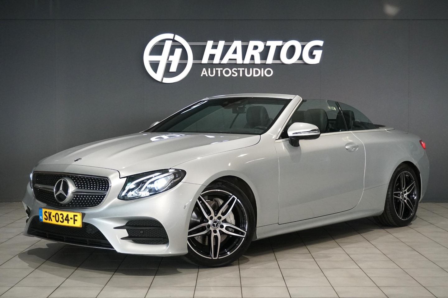 Mercedes-Benz E-klasse Cabrio - 200 Premium AMG + CAMERA / AIRSCARF / SFEERVERLICHTING - AutoWereld.nl