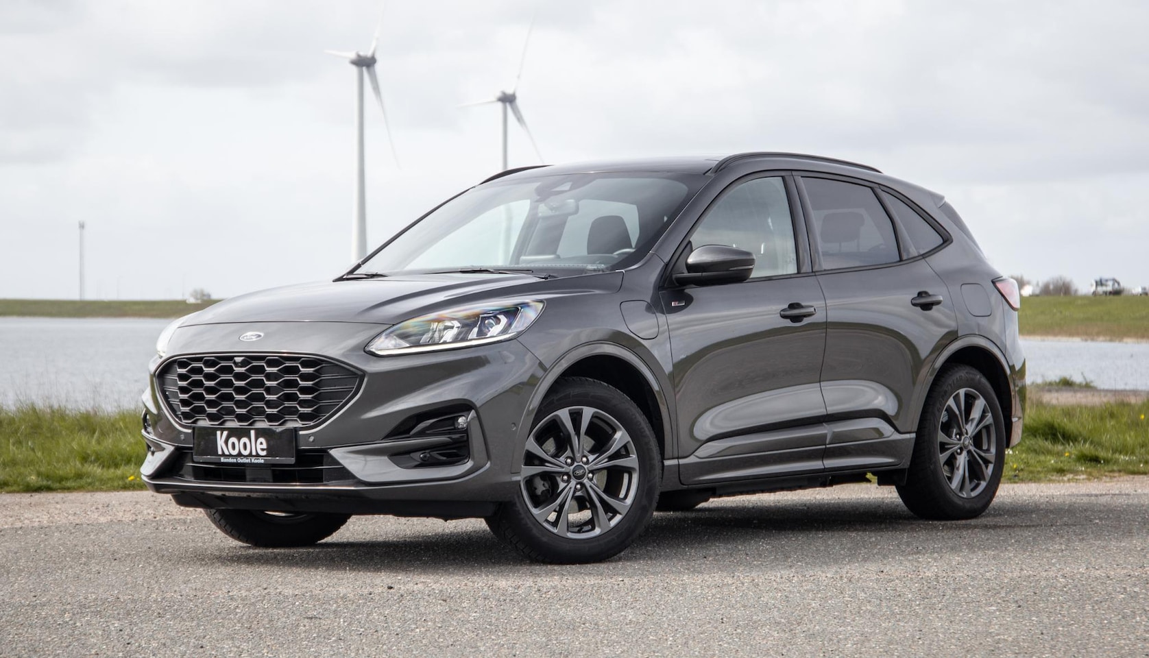Ford Kuga - 2.5 PHEV ST-Line PANORAMADAK / CARPLAY / TREKHAAK / DEALER ONDERHOUDEN / CAMERA - AutoWereld.nl