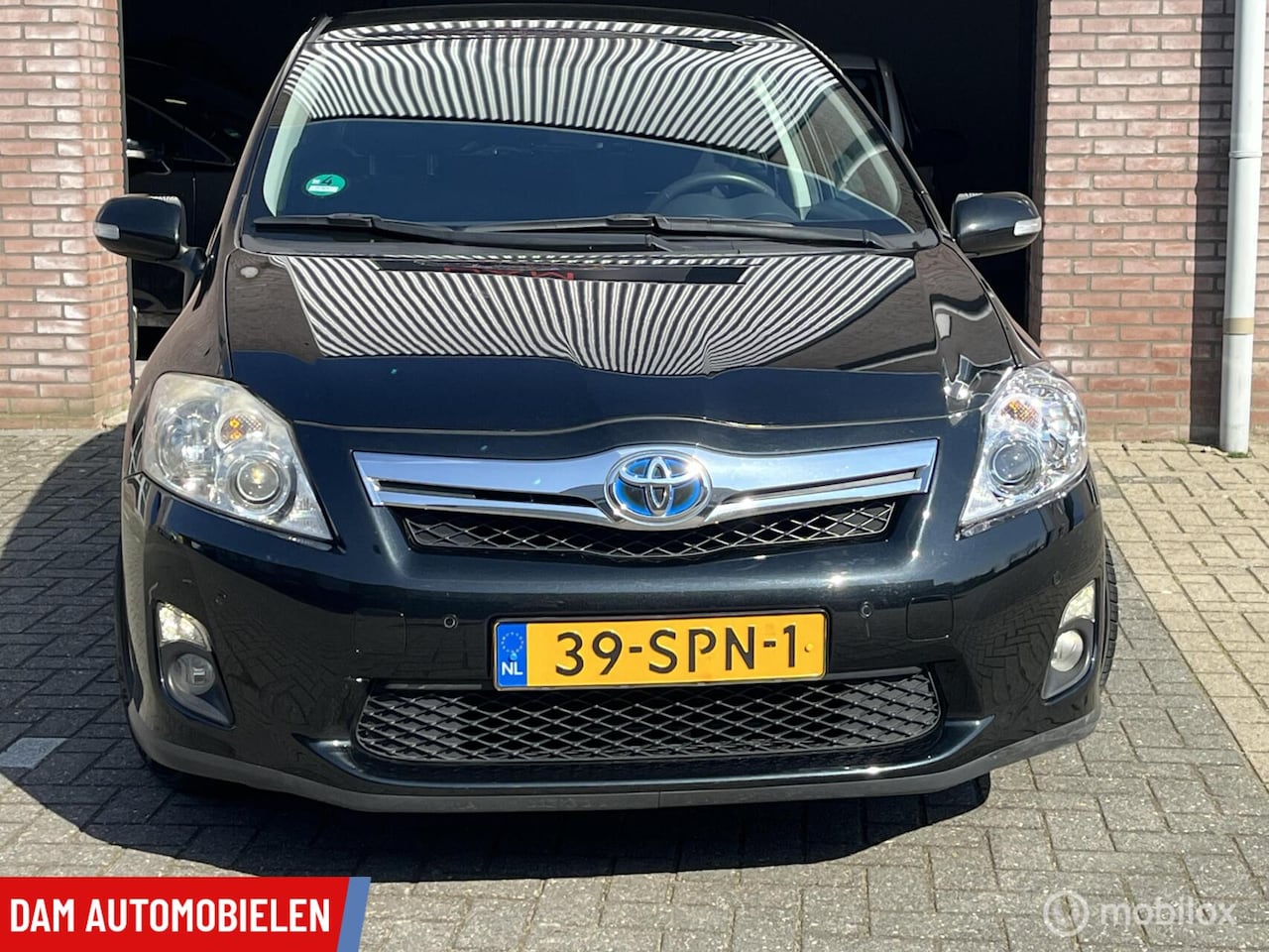 Toyota Auris - 1.8 Full Hybrid 199.502 KM NAP, Airco, Navi,Cruis C. Zeer nette auto! - AutoWereld.nl