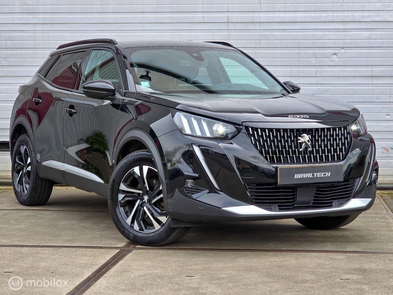 Peugeot 2008 - 1.2 PureTech GT ACC Carplay Camera 3D scherm - AutoWereld.nl