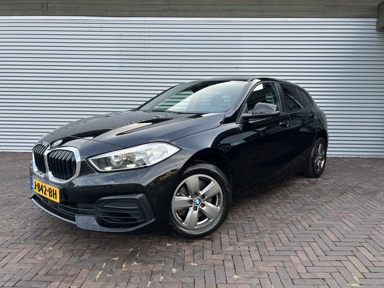 BMW 1-serie - 118i lage km - AutoWereld.nl