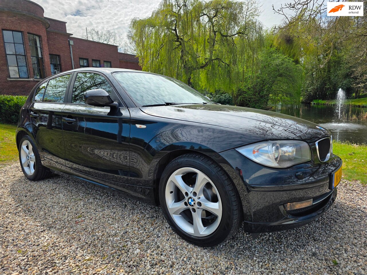 BMW 1-serie - 118i High Executive AUTOMAAT/airco/XENON/cruise - AutoWereld.nl