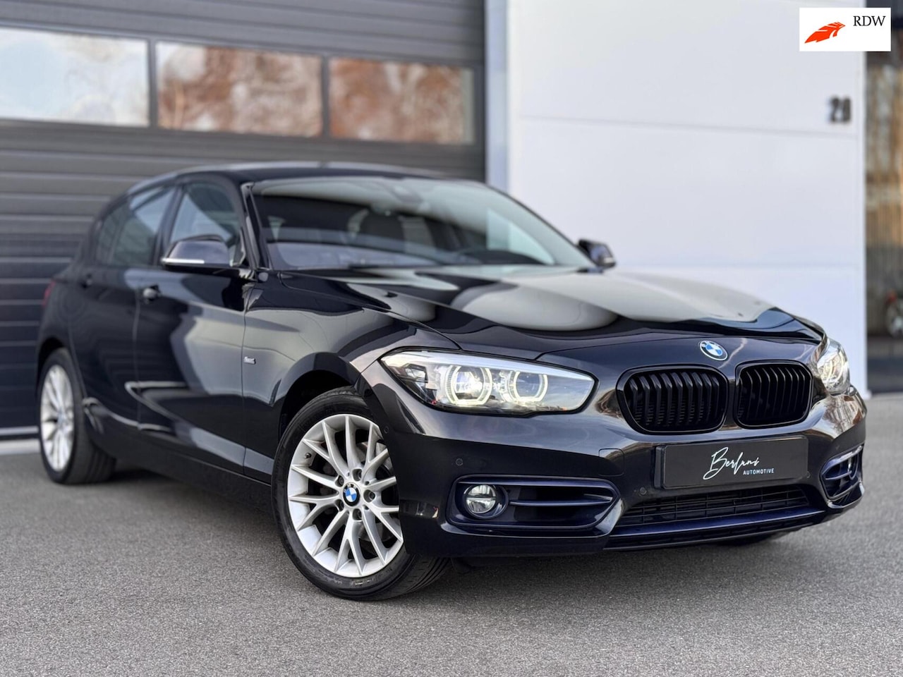 BMW 1-serie - 118d xDrive High Executive Sport |Carplay|Camera - AutoWereld.nl
