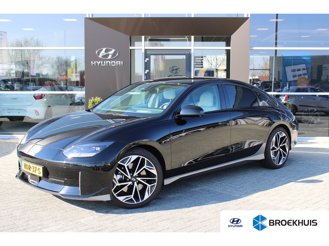 Hyundai IONIQ 6 - Lounge AWD 77 kWh | 1500KG trekgewicht | V2L | Elektrische stoelverstelling met geheugenfu - AutoWereld.nl