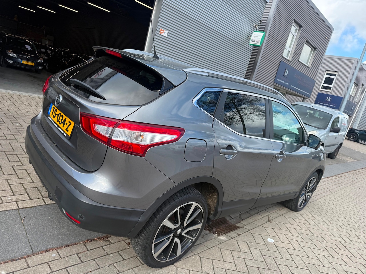 Nissan Qashqai - 1.2 Tekna/Pano/Navigatie/Camera 360 - AutoWereld.nl