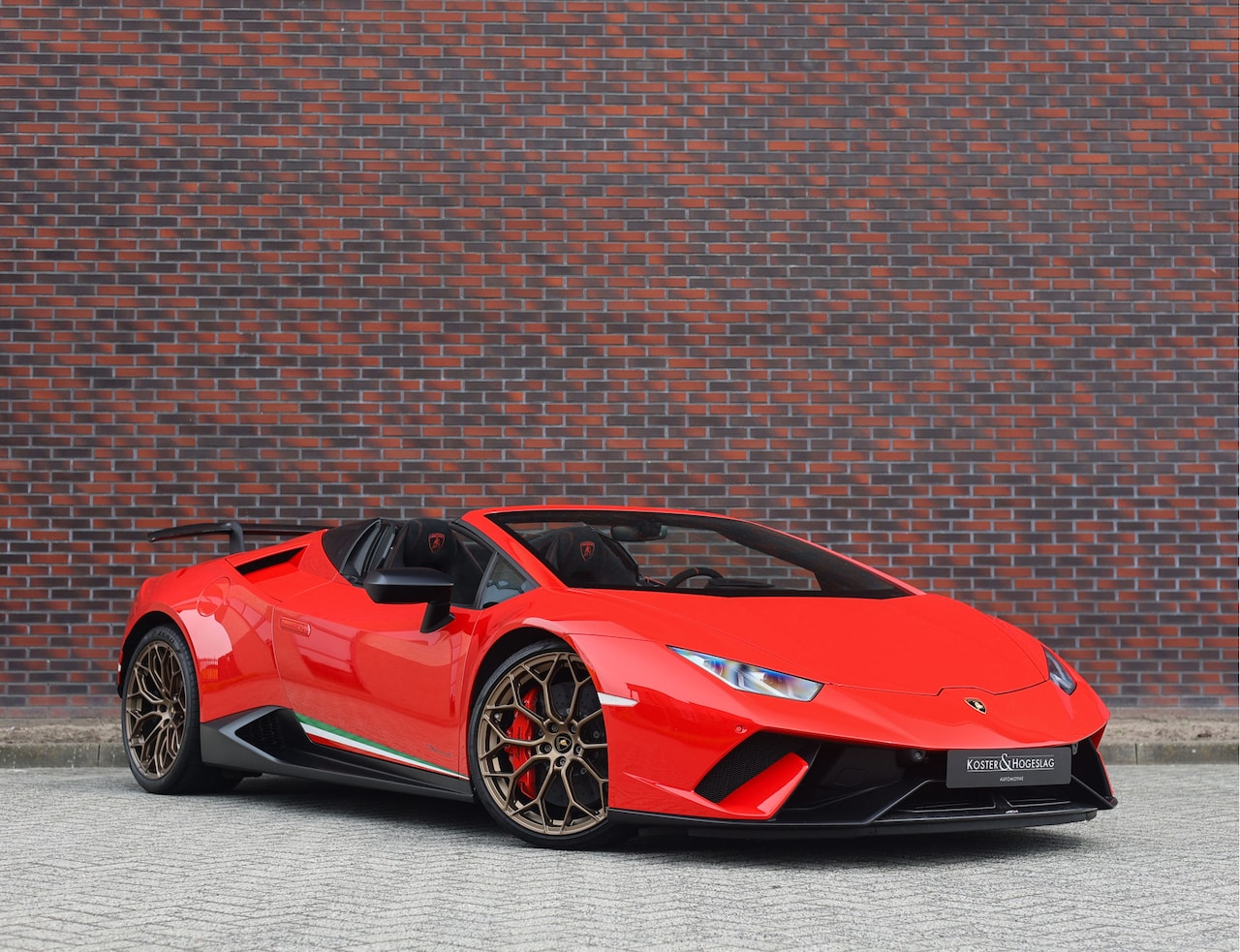 Lamborghini Huracán - 5.2 V10 Performante Spyder | Misano Red - Sensonum - AutoWereld.nl