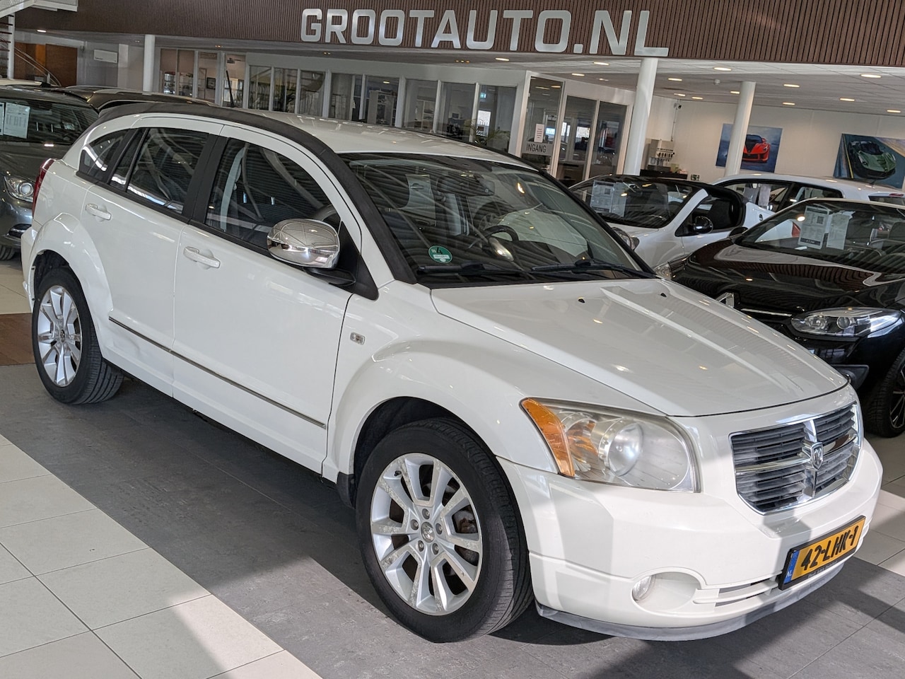 Dodge Caliber - 2.0 Sport Airco, Cruise Control, Trekhaak, Stuurbekrachtiging - AutoWereld.nl