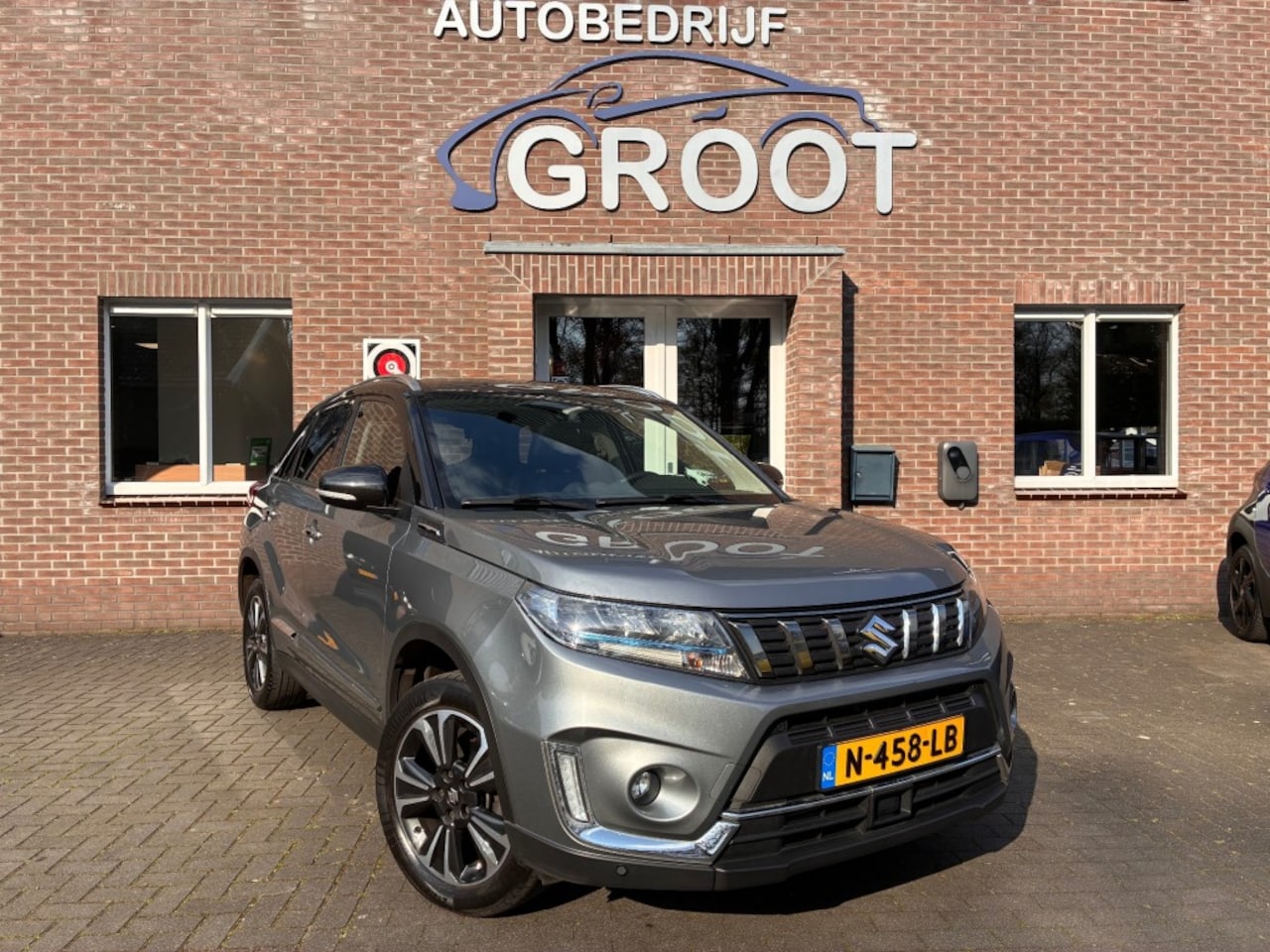 Suzuki Vitara - 1.4 Boosterjet Style Smart Hybrid! TREKHAAK/LEER/PANO.DAK - AutoWereld.nl