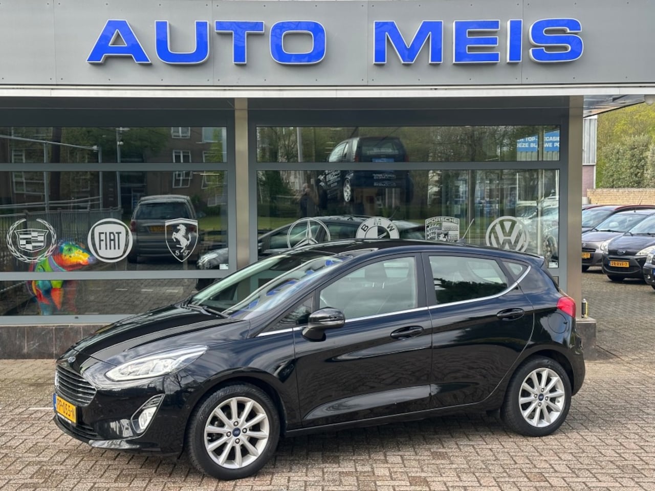 Ford Fiesta - 1.0 ECOB. Titanium Airco Navi Camera Telefoon Cruise - AutoWereld.nl