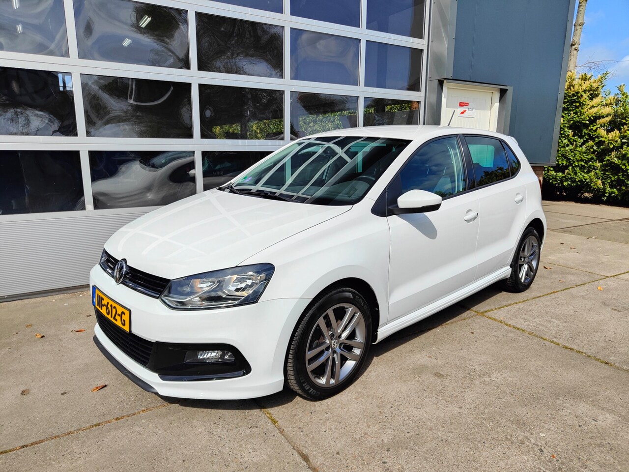 Volkswagen Polo - 1.2 TSI Comfortline R-LIne - AutoWereld.nl