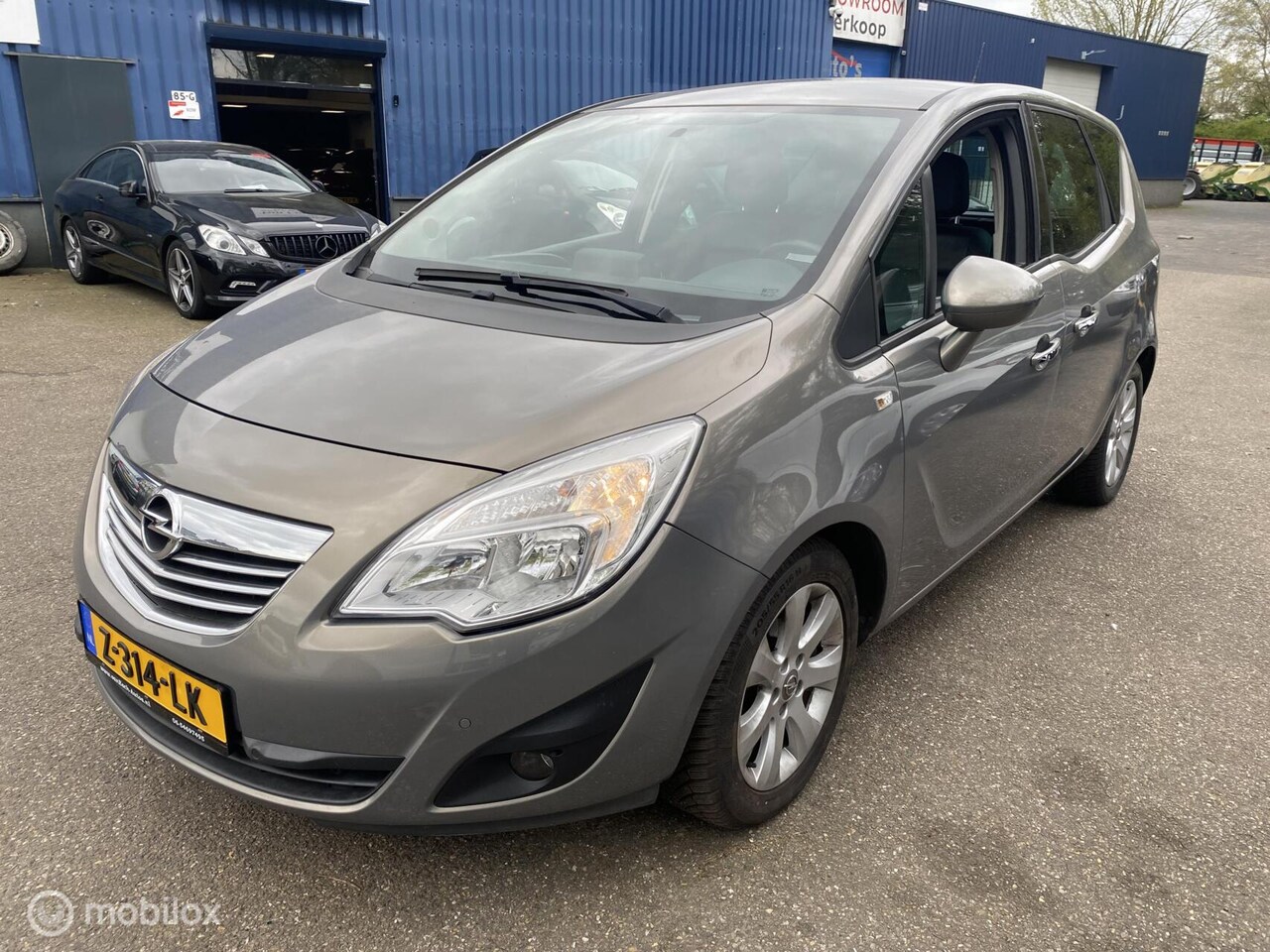 Opel Meriva - 1.4 Cosmo 93.DKM STOEL/STUUR VERW ECC NAVI PDC CRUISE LEDER - AutoWereld.nl