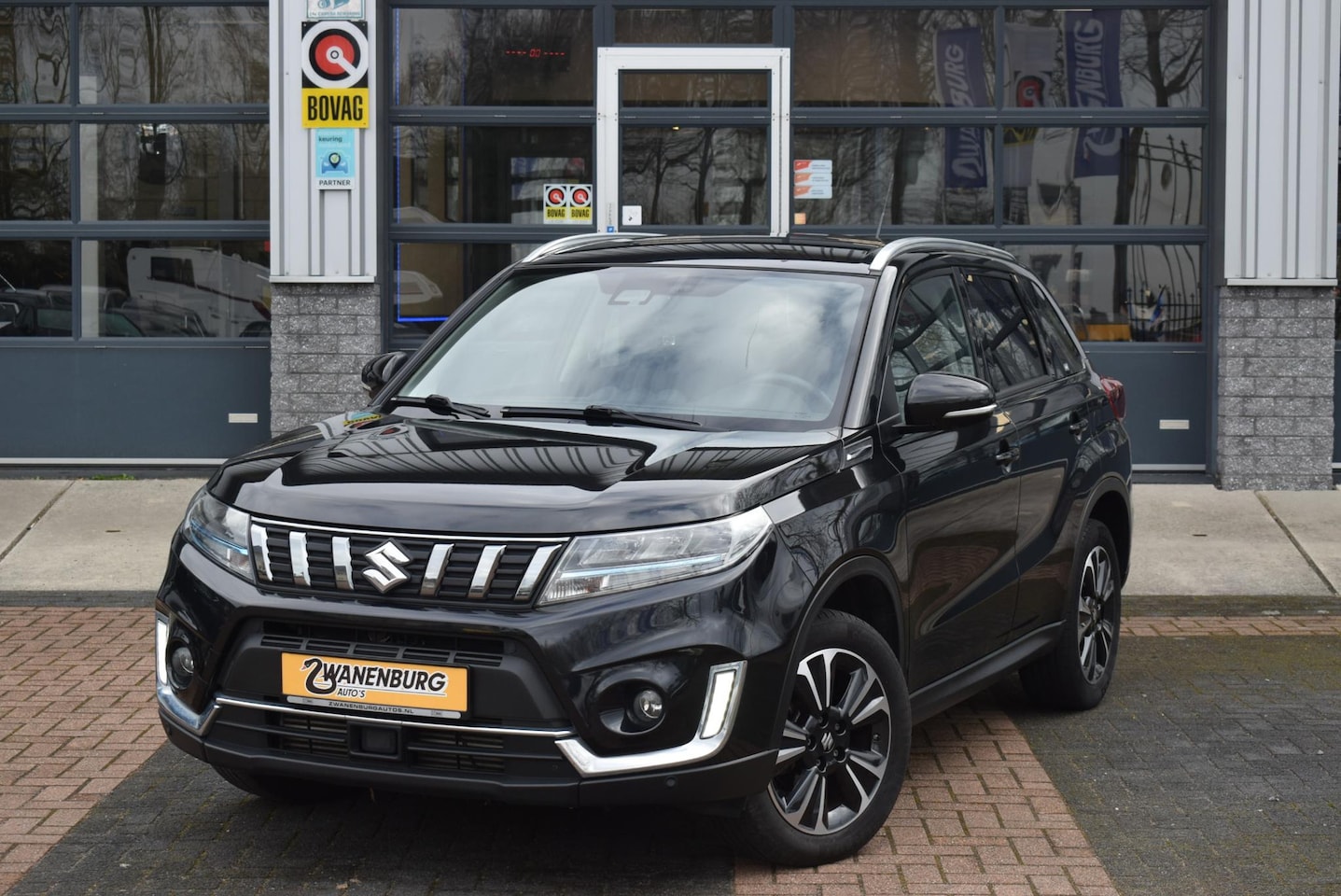 Suzuki Vitara - 1.4 Boosterjet Style Smart Hybrid Navi Leder Airco Camera Km 65.000!! - AutoWereld.nl