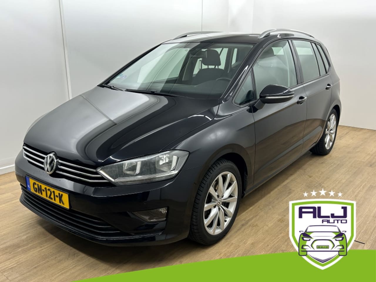 Volkswagen Golf Sportsvan - Occasion 1.2 TSI Comfortline | Zwart | Airco | Bluetooth audio | Cruisecontrol | Trekhaak - AutoWereld.nl