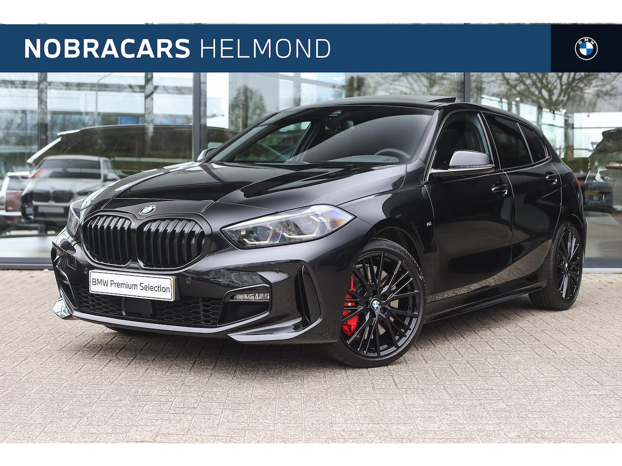 BMW 1-serie - 118i High Executive M Sport Automaat / Panoramadak / Sportstoelen / Adaptieve LED / Achter - AutoWereld.nl