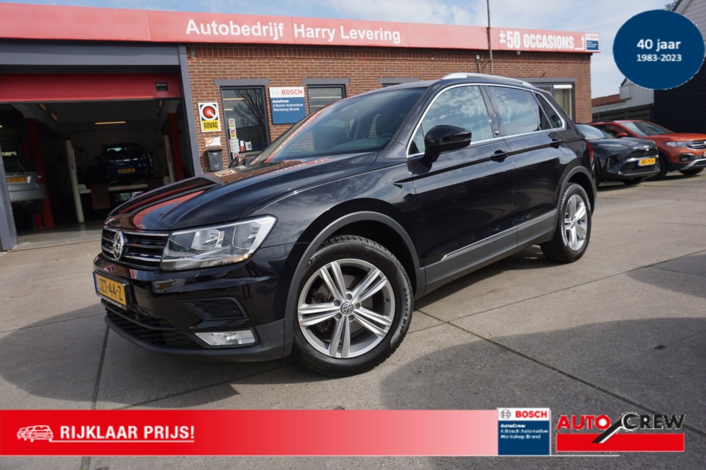 Volkswagen Tiguan - 1.4 TSI 125pk Comfortline Business SOUND Navigatie - AutoWereld.nl
