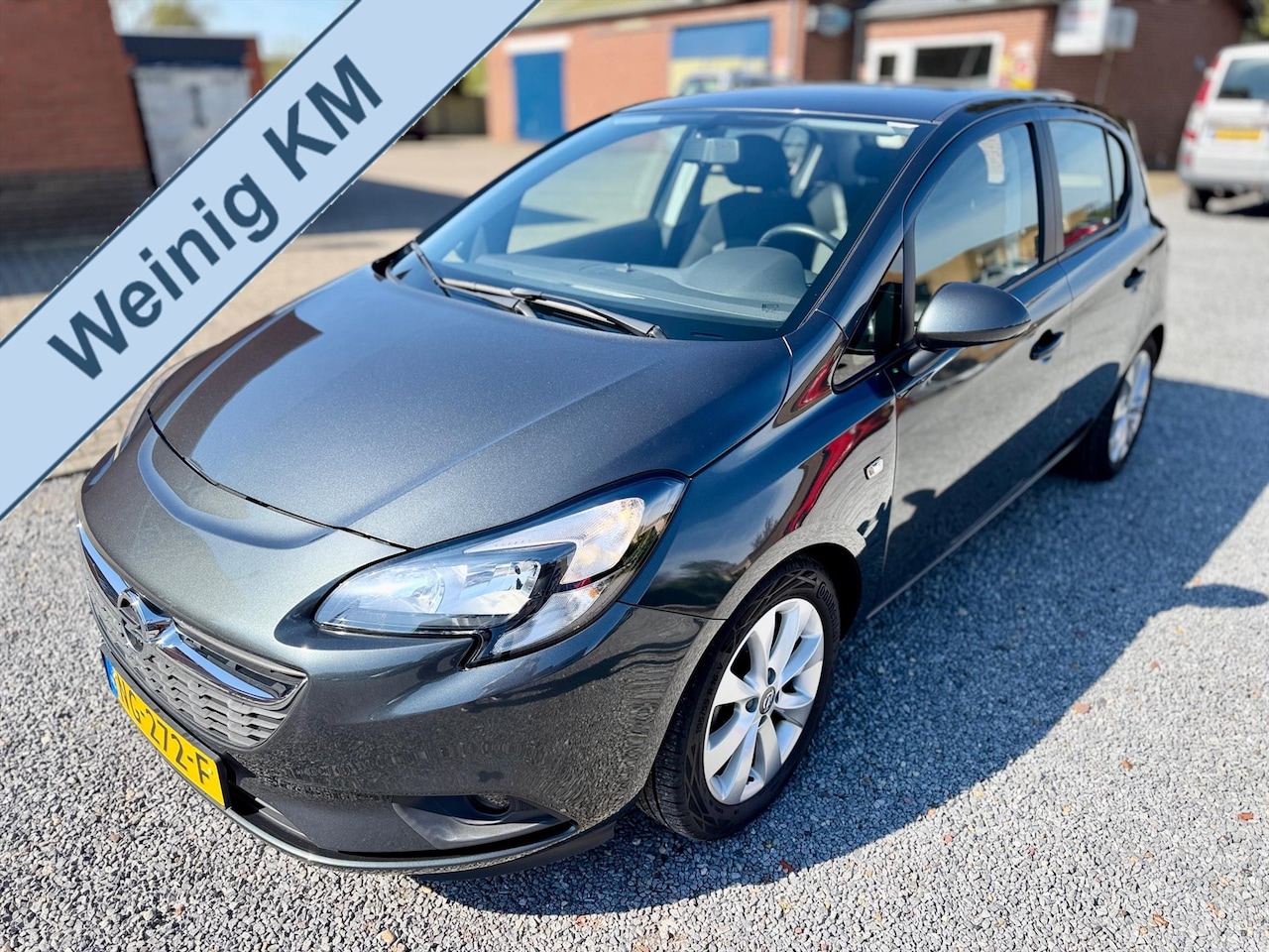 Opel Corsa - 1.4 Edition | Lage kilometerstand | Airco | Stoelverwarming | Zeer compleet! - AutoWereld.nl