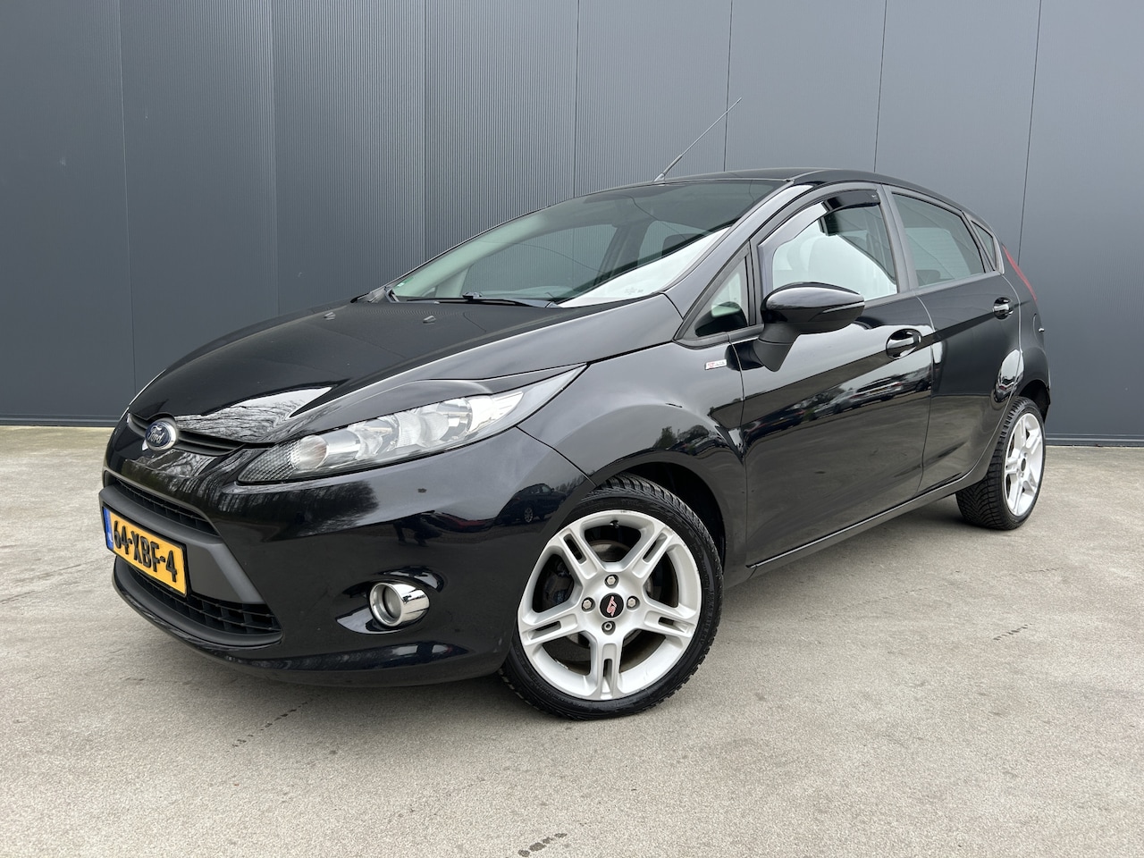 Ford Fiesta - 1.6 TDCi Ghia CRUISE AIRCO 5 DEURS - AutoWereld.nl
