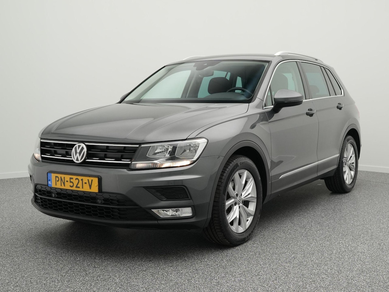 Volkswagen Tiguan - 1.4 TSI 125 PK Comfortline Business | Navigatie | Adaptieve Cruise Control | Trekhaak | Cl - AutoWereld.nl
