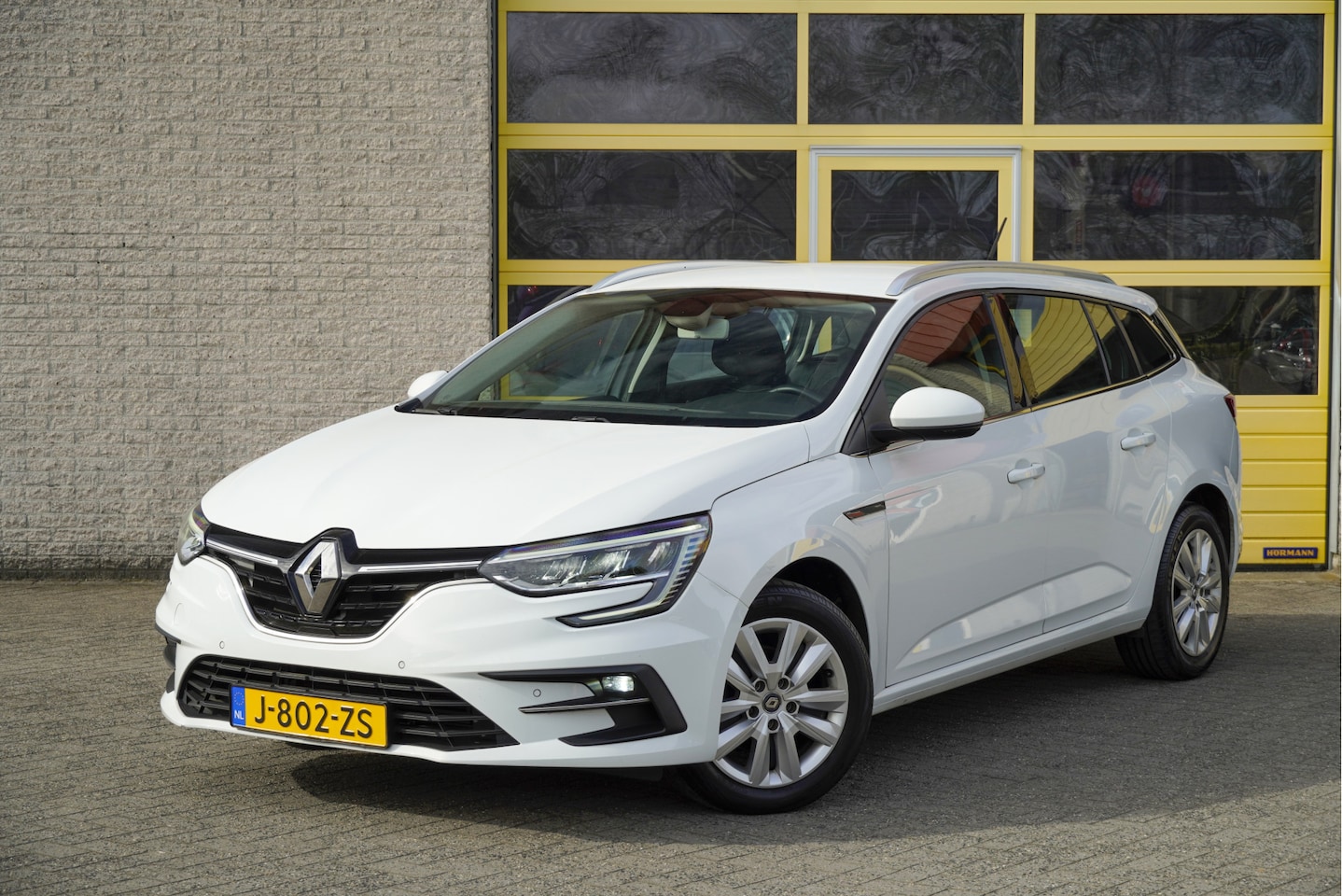 Renault Mégane Estate - 1.3 TCe Business Zen BJ2020 Led V+A | Dynamische knipperlichten | Pdc | App-Connect | Navi - AutoWereld.nl