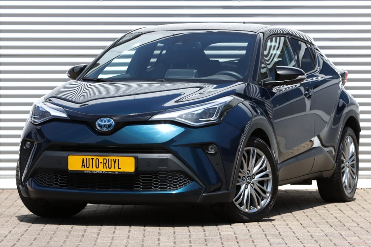 Toyota C-HR - 1.8 Hybrid Style Bi-Tone Carplay / Safety Pakket / Navi - AutoWereld.nl
