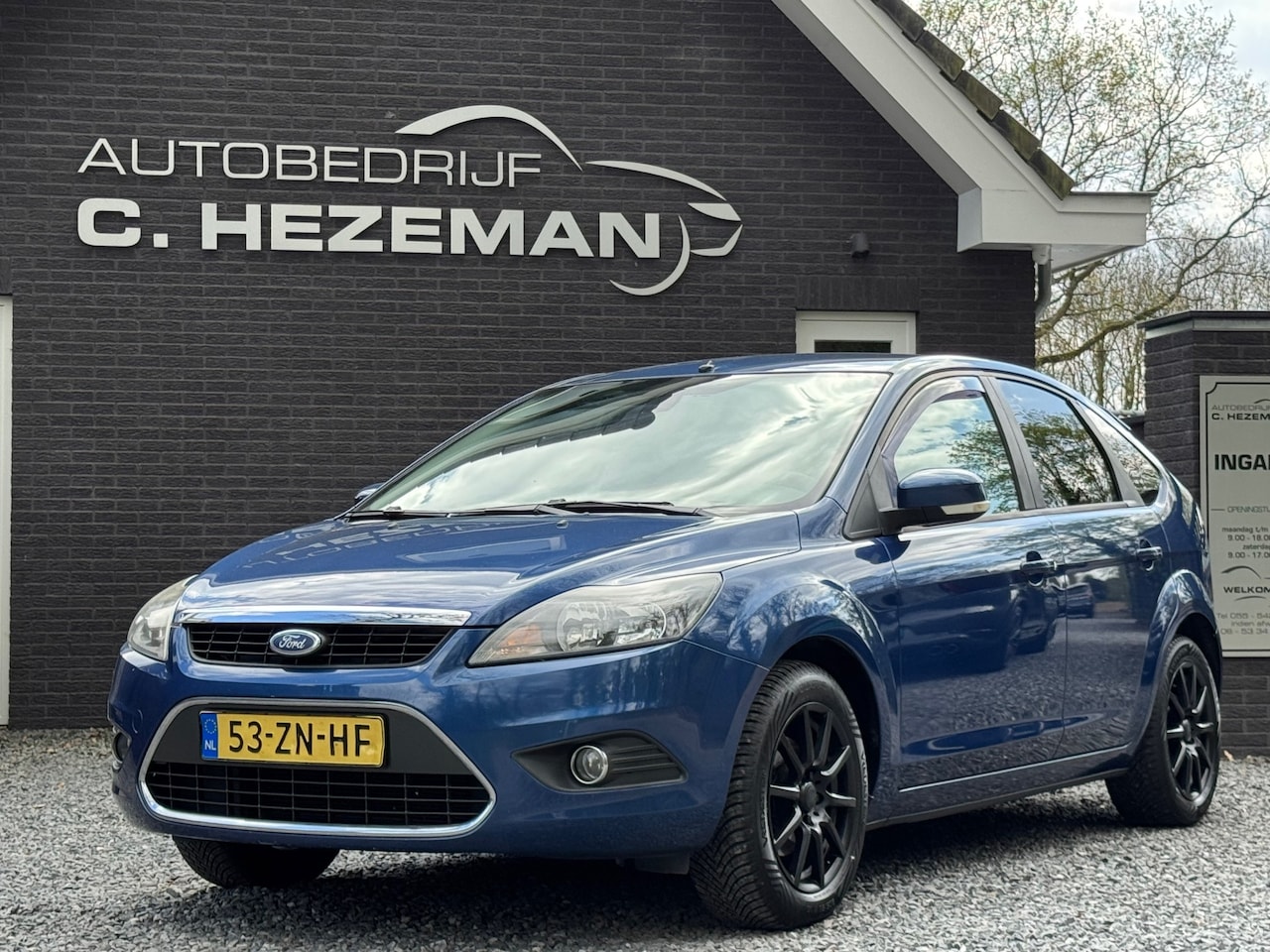 Ford Focus - 1.6 Titanium Navigatie Cruise Control Climate Control trekhaak PDC - AutoWereld.nl